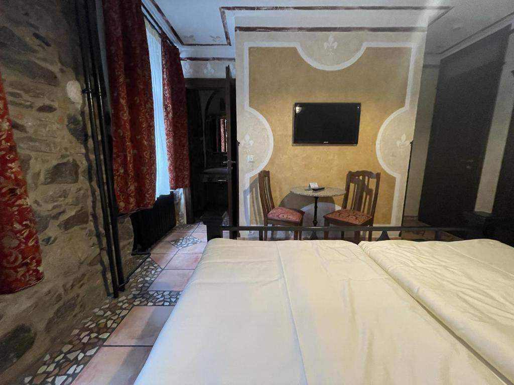 Postel nebo postele na pokoji v ubytování Black Forest Hotel Todtnau