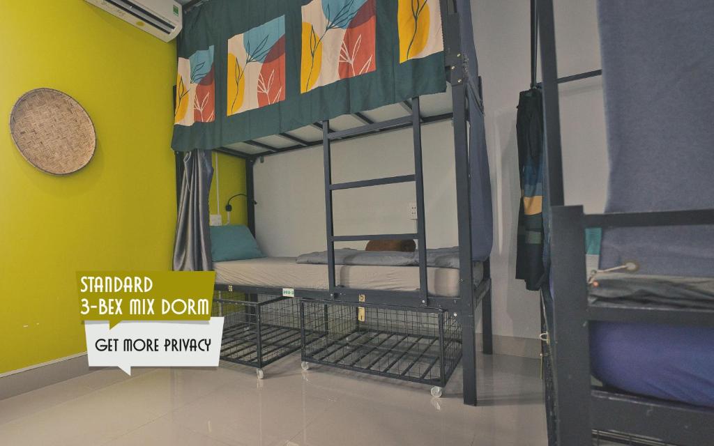 Postel nebo postele na pokoji v ubytování The Imperfect Downtown Hostel
