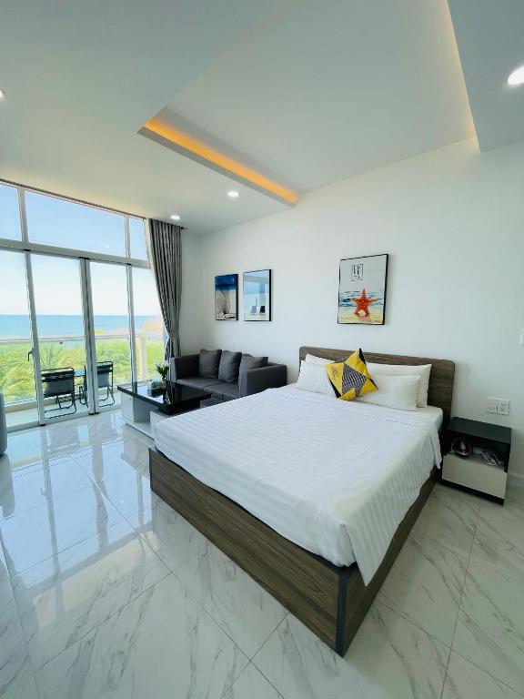 Giường trong phòng chung tại Sealiks Ocean vita muine C326