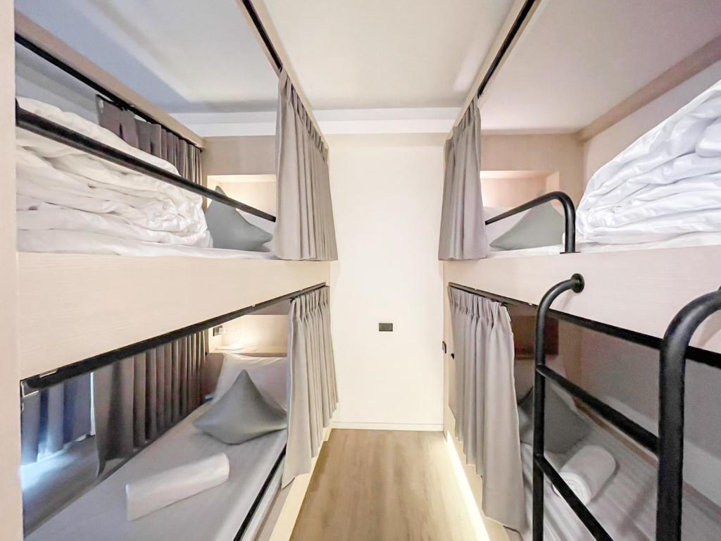 Postel nebo postele na pokoji v ubytování YAA Hostel