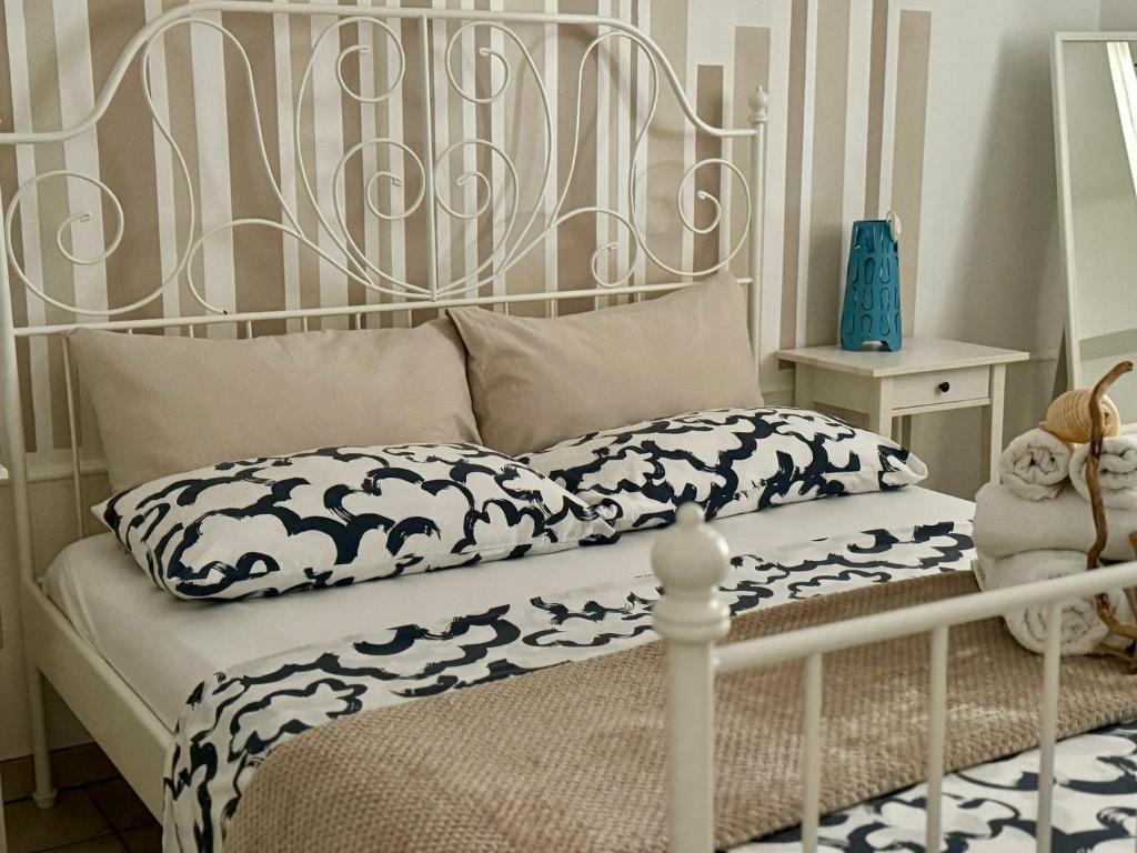 Postel nebo postele na pokoji v ubytování Cozzo Spadaro B&B