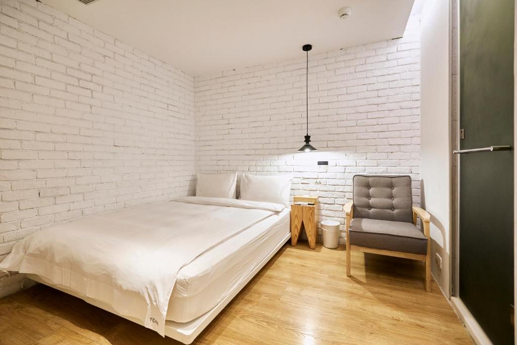 Postel nebo postele na pokoji v ubytování York Hotel