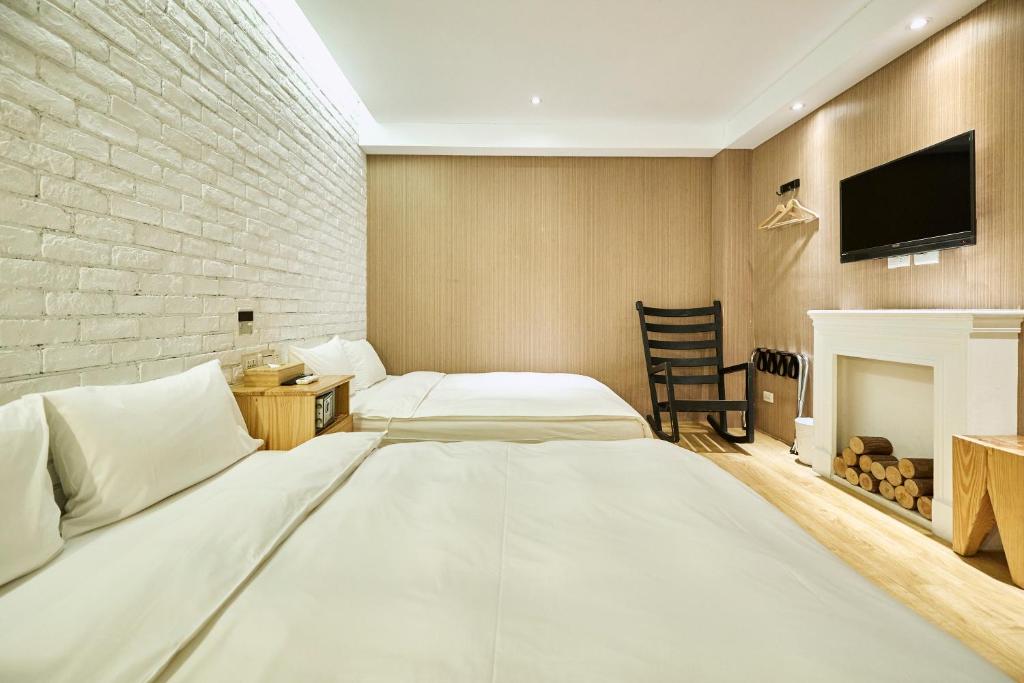 Postel nebo postele na pokoji v ubytování York Hotel