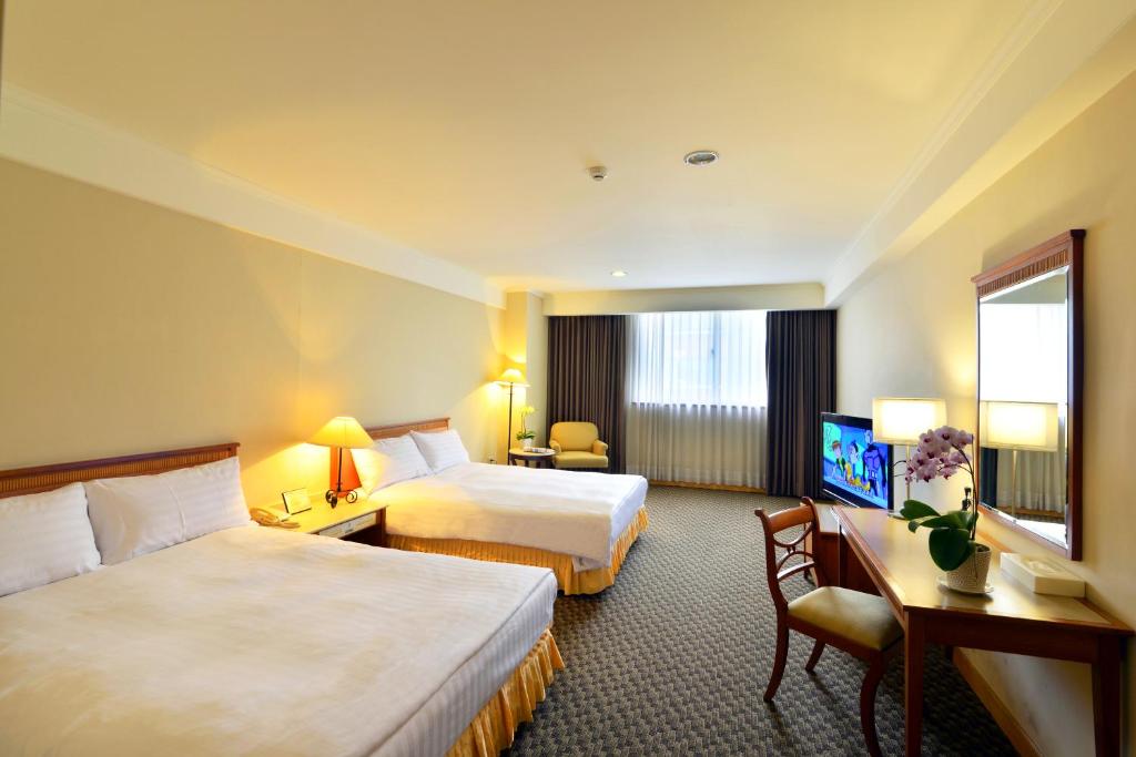 Postel nebo postele na pokoji v ubytování Apollo Hotel