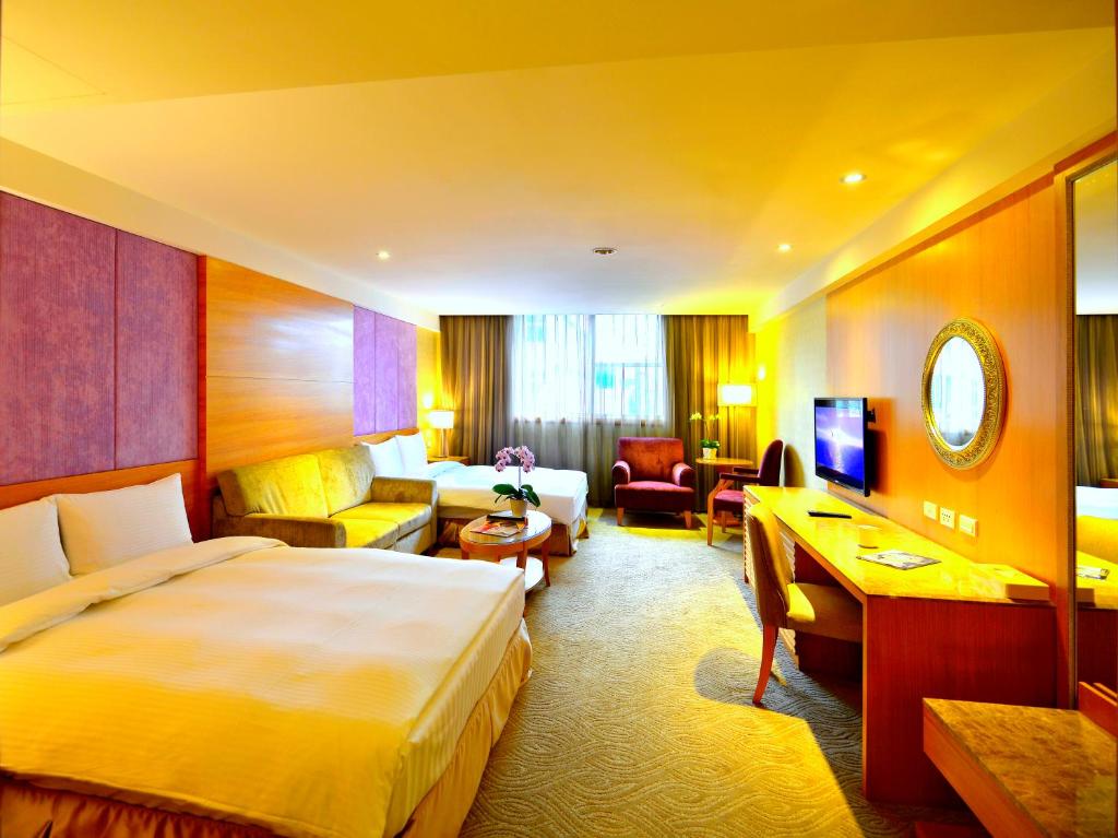 Postel nebo postele na pokoji v ubytování Apollo Hotel
