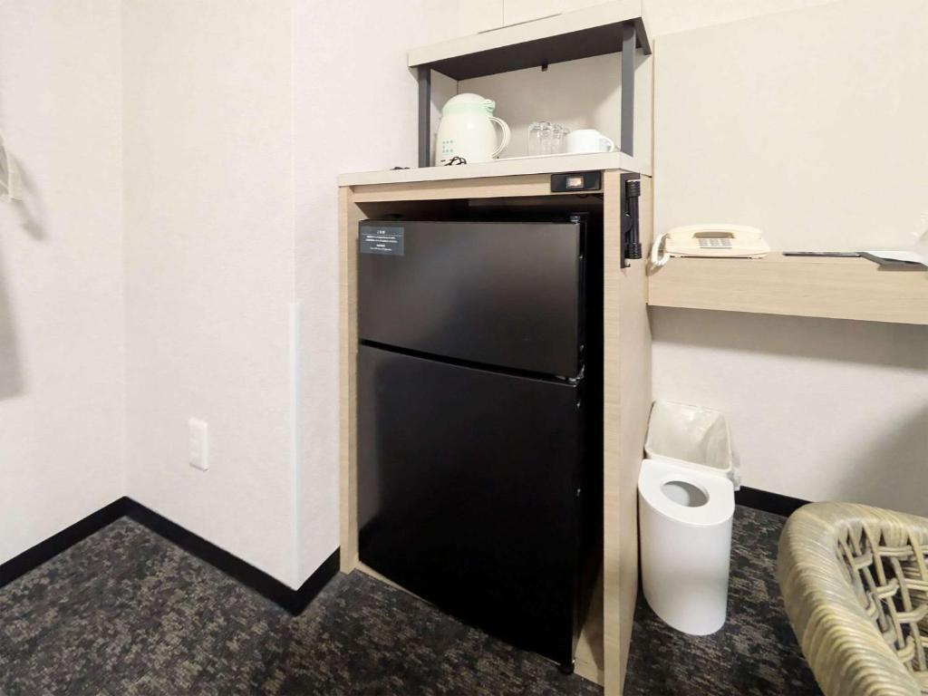 Kuchyň nebo kuchyňský kout v ubytování Comfort Hotel Naha Prefectural Office