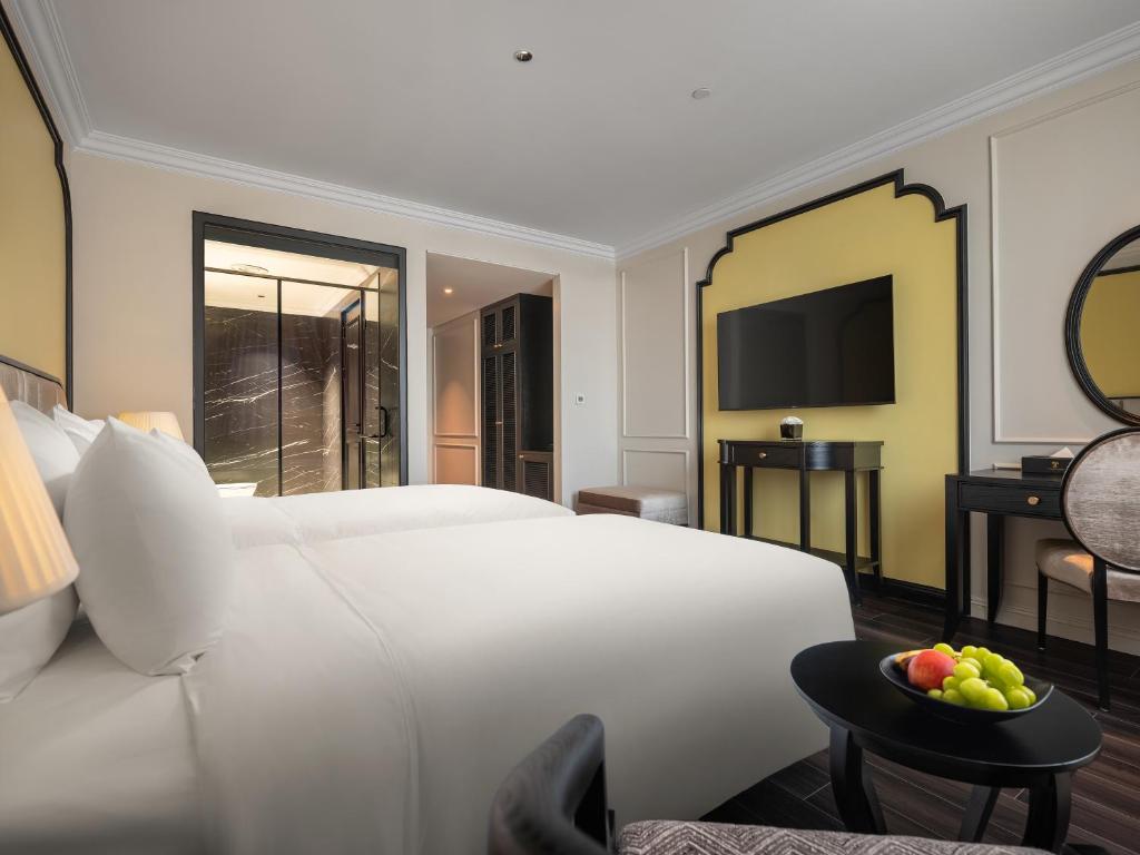 TV a/nebo společenská místnost v ubytování T Boutique Hotel