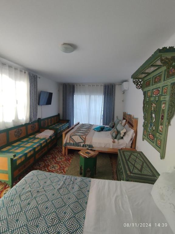 Postel nebo postele na pokoji v ubytování Maison Albatros