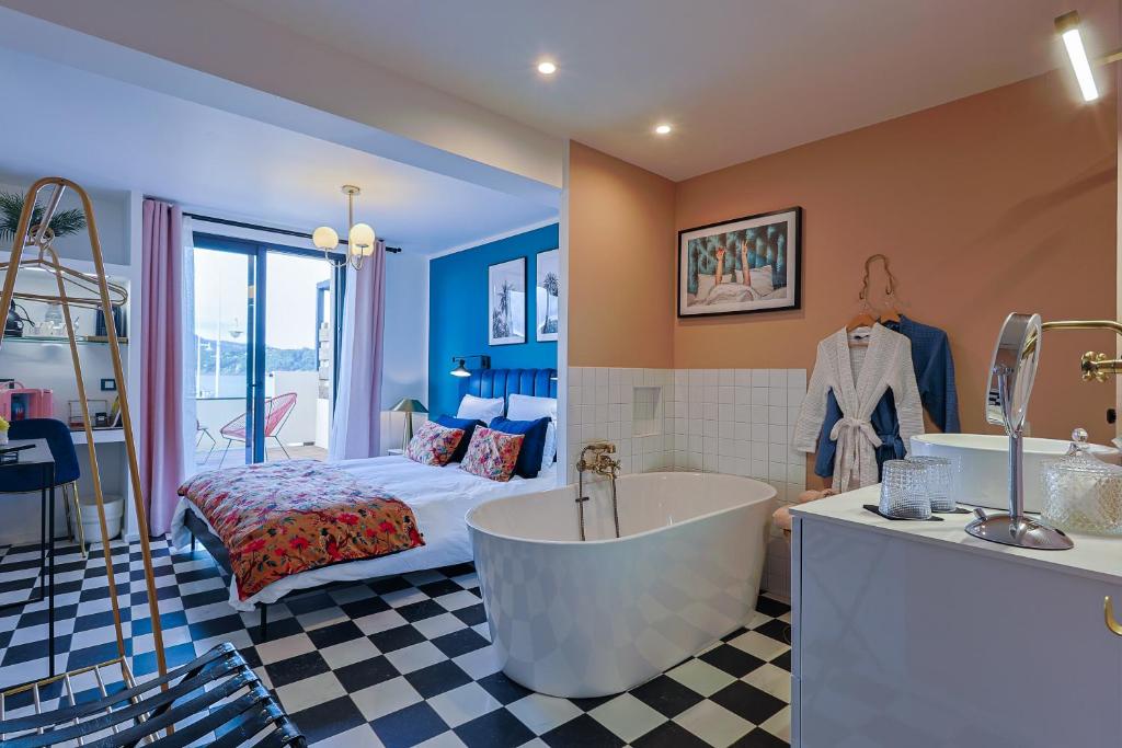 Postel nebo postele na pokoji v ubytování Chambre d'hôte luxe vue mer Miami