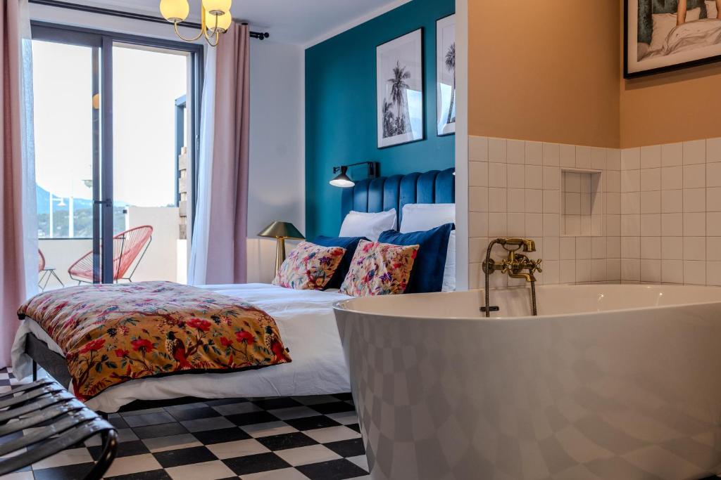 Postel nebo postele na pokoji v ubytování Chambre d'hôte luxe vue mer Miami