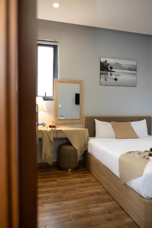 Giường trong phòng chung tại Gia Nguyễn Hotel Dalat