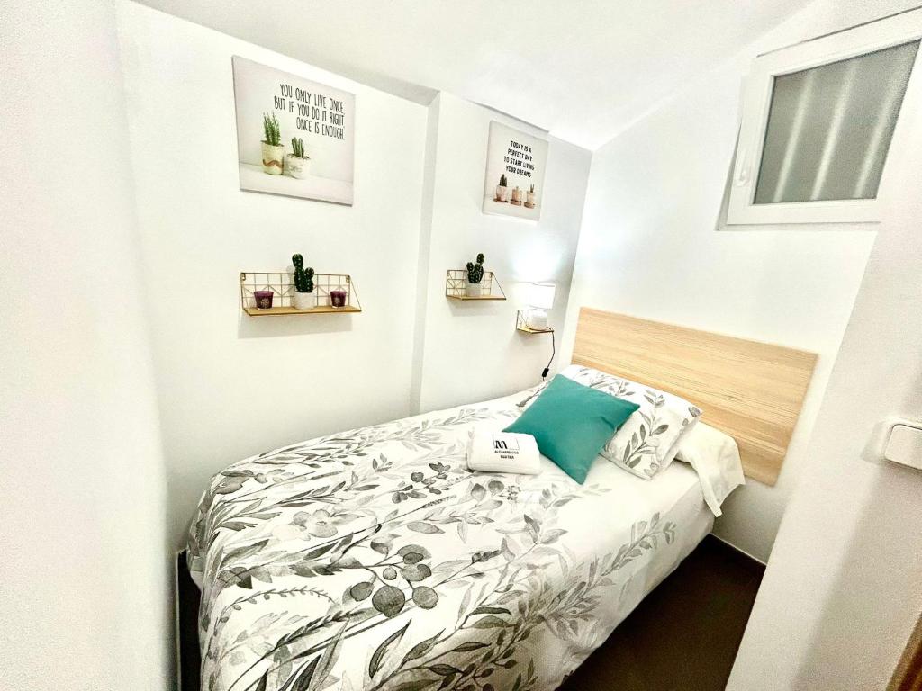 A bed or beds in a room at O LAR DE MARTINA