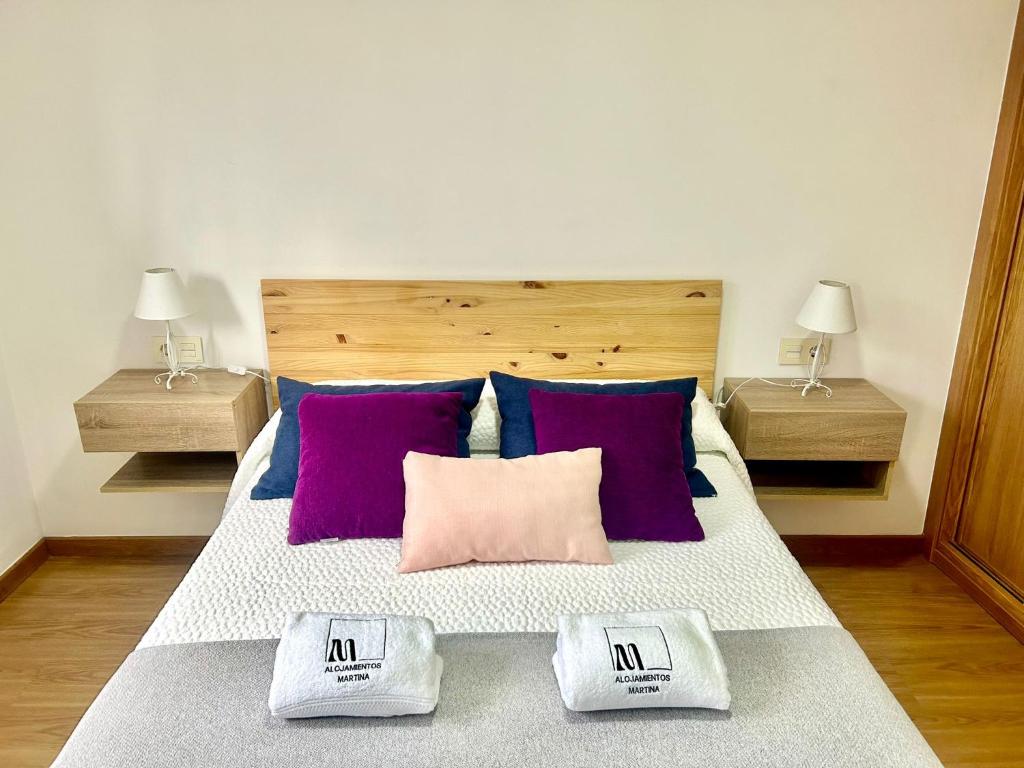 A bed or beds in a room at O LAR DE MARTINA