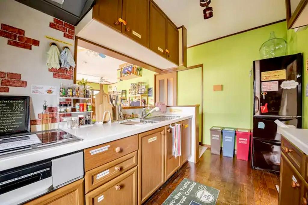Kuchyň nebo kuchyňský kout v ubytování Guesthouse Murabito
