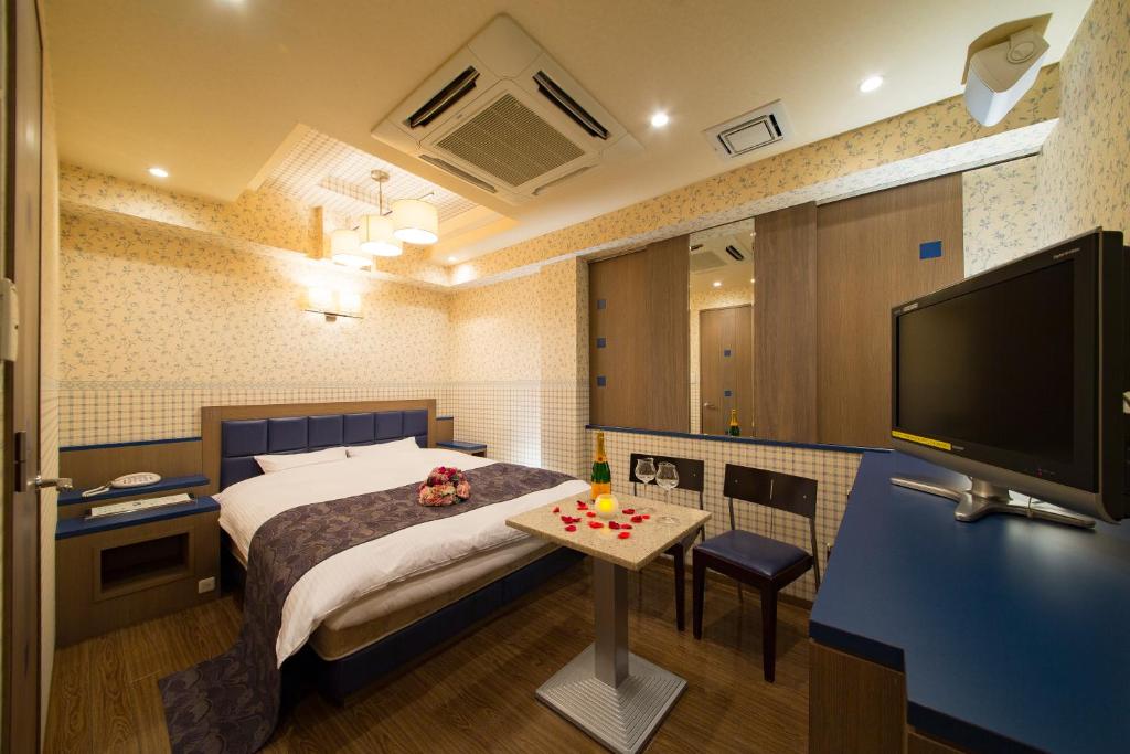 Postel nebo postele na pokoji v ubytování HOTEL THE i Adult only