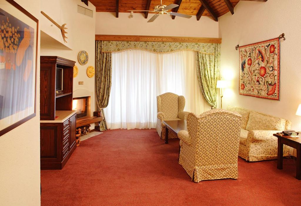 Posezení v ubytování HOTEL SPA MONTANA