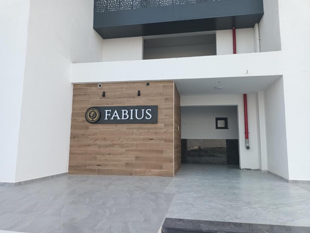 a front door of a building with a sign on it at Fabius 12 Caesars Resort & Spa in Iskele