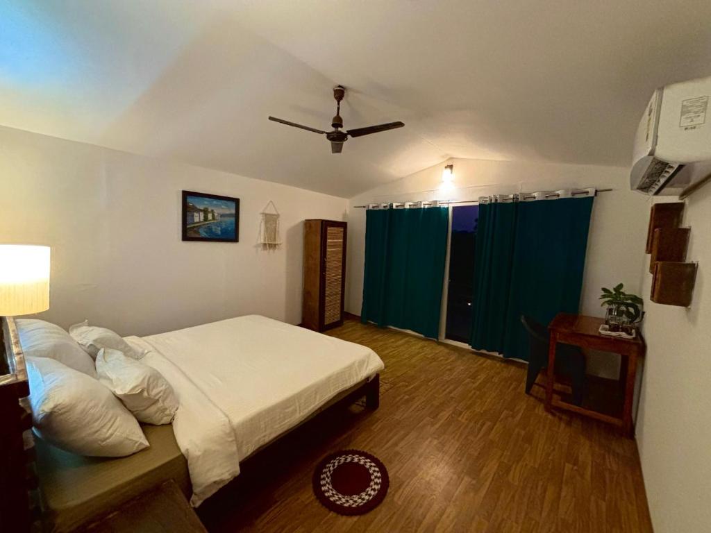Postel nebo postele na pokoji v ubytování BRAMHA COTTAGES