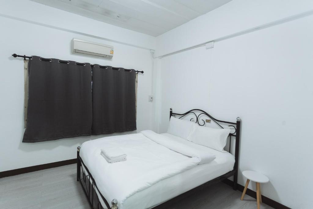 Giường trong phòng chung tại GO INN Maya - Nimman Chiang Mai