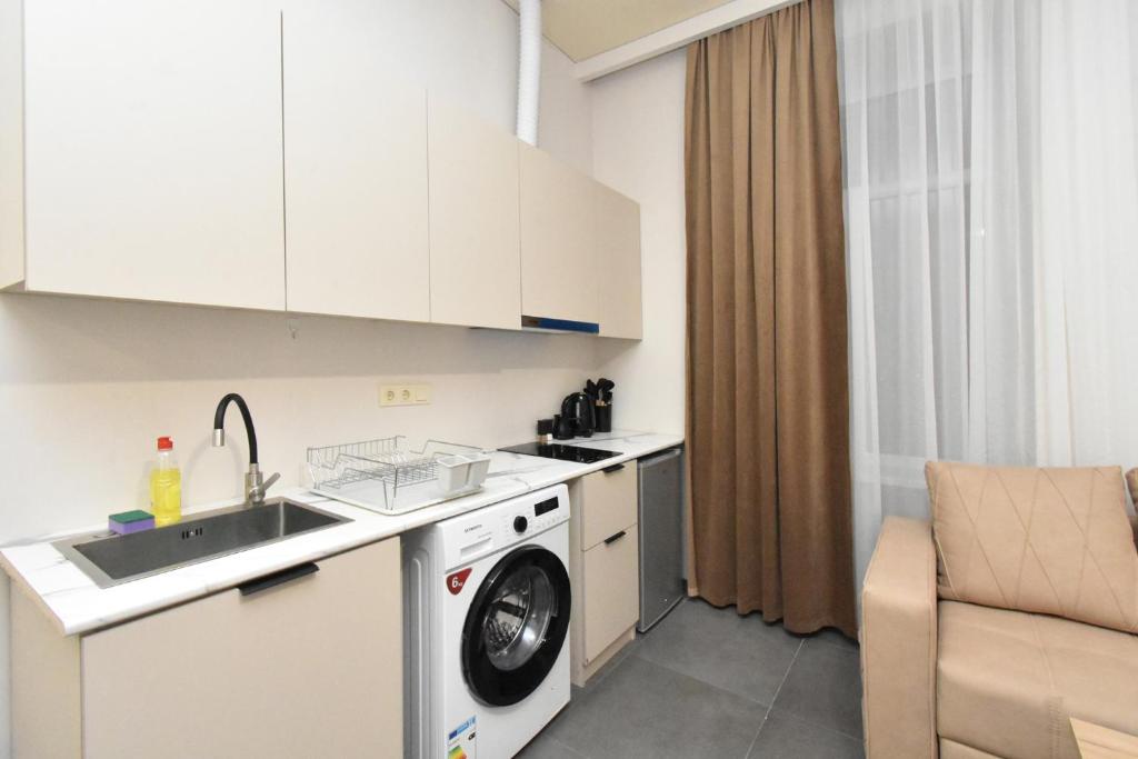 Kuchyň nebo kuchyňský kout v ubytování Seva Apart-Hotel Komitas