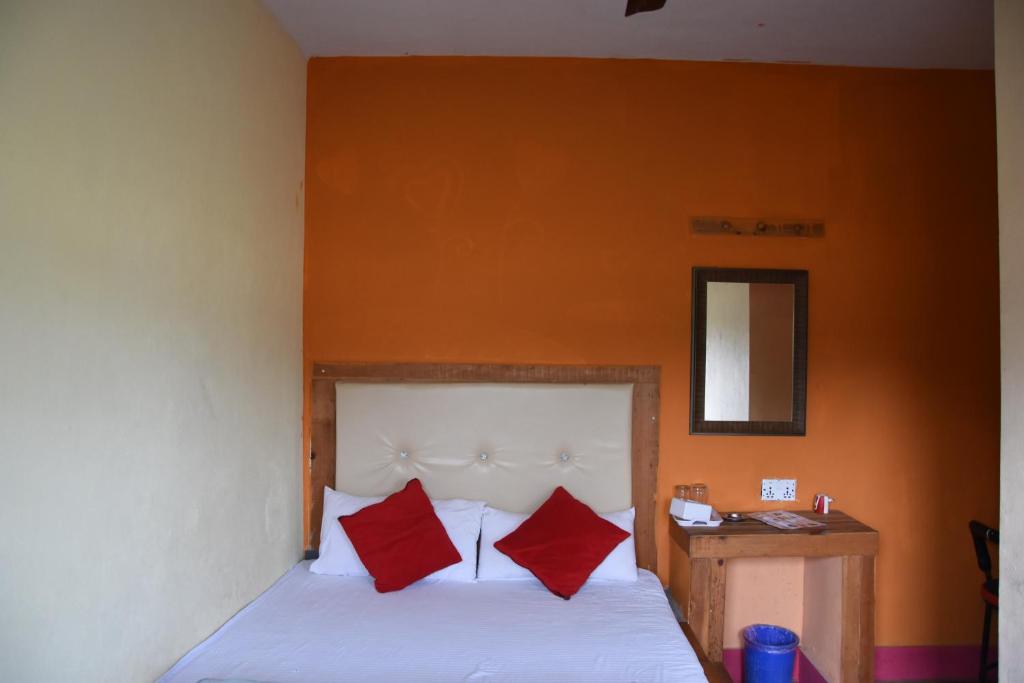 Postel nebo postele na pokoji v ubytování Hong Qi Hotel