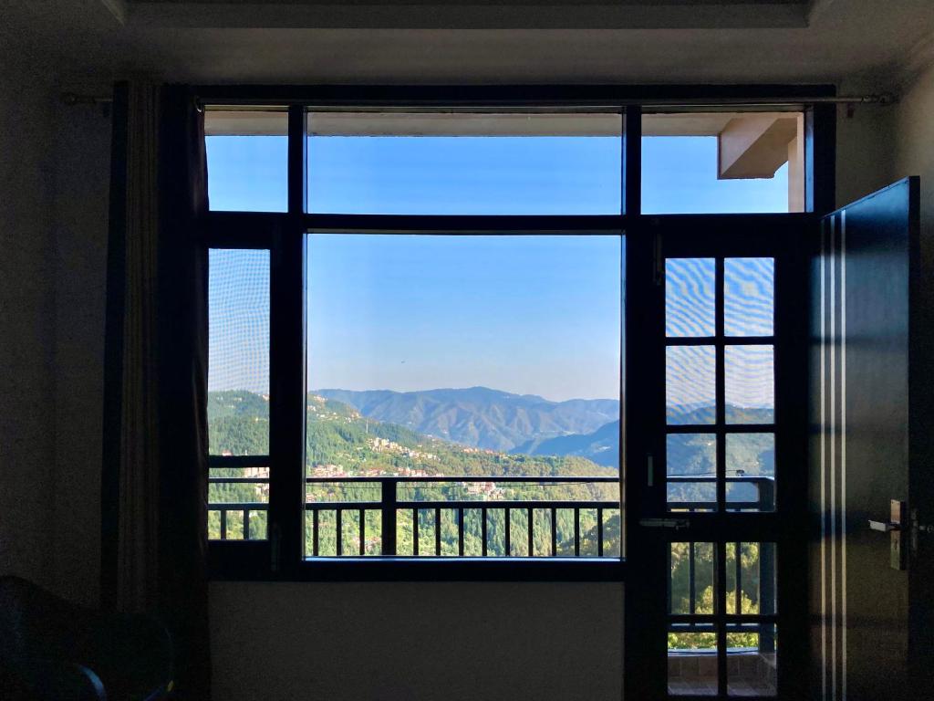 Nespecifikovaný výhled na hory nebo výhled na hory při pohledu z bed and breakfast