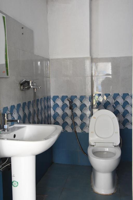 Koupelna v ubytování Hong Qi Hotel