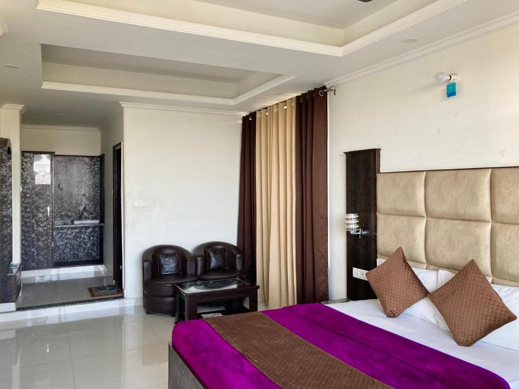 Postel nebo postele na pokoji v ubytování Tanwar B&B (bloominn)