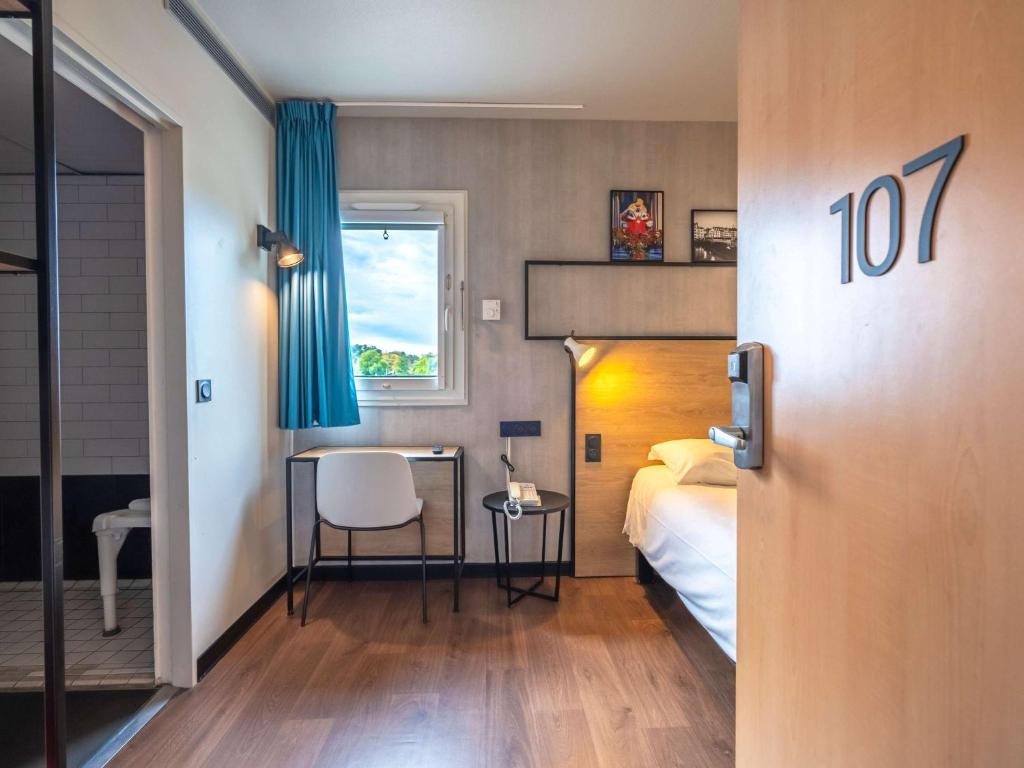 Postel nebo postele na pokoji v ubytování ibis Bayonne Centre