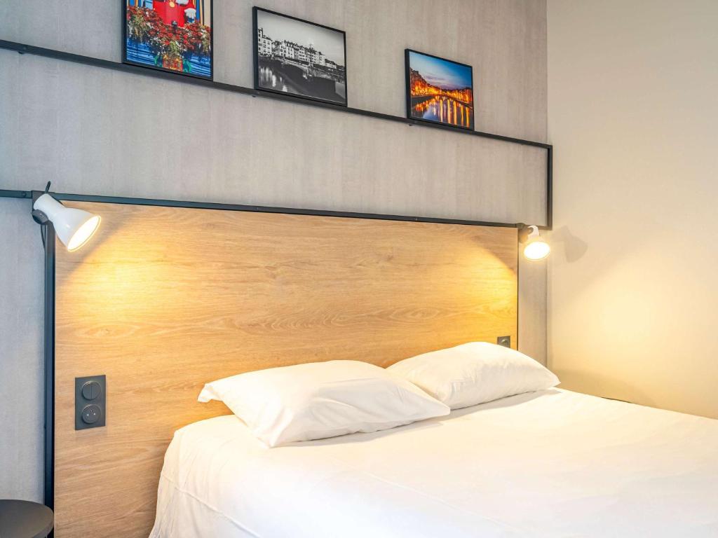 Postel nebo postele na pokoji v ubytování ibis Bayonne Centre