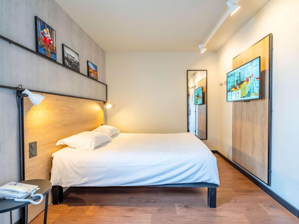 Postel nebo postele na pokoji v ubytování ibis Bayonne Centre