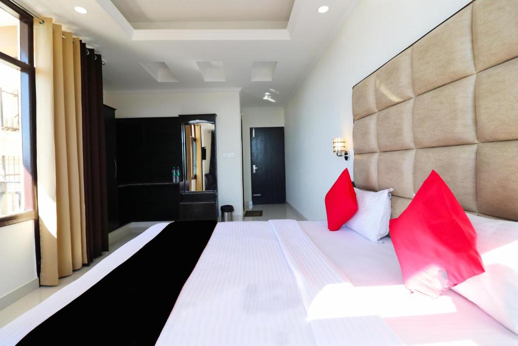 Postel nebo postele na pokoji v ubytování Tanwar B&B (bloominn)