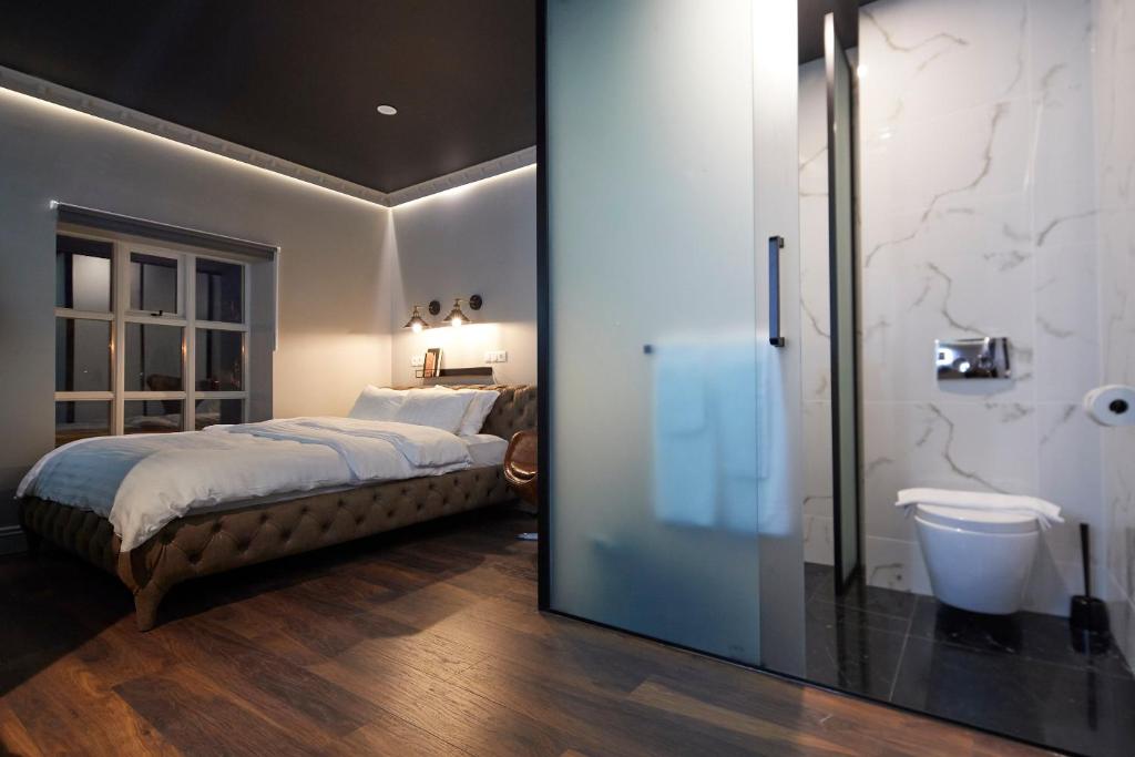 Postel nebo postele na pokoji v ubytování Hotel Akureyri