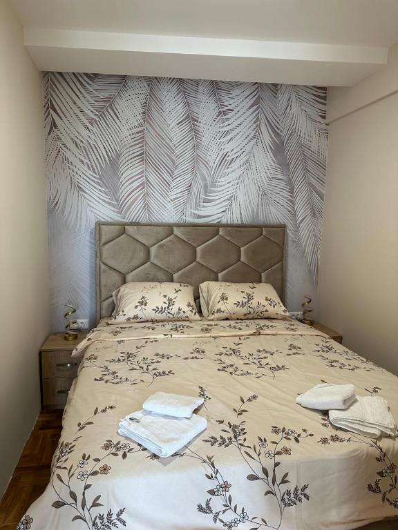 Postel nebo postele na pokoji v ubytování Apartman Happy Moments Kraljevo