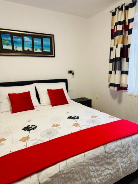 Postel nebo postele na pokoji v ubytování Apartments Paradise