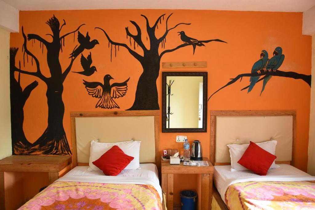 Postel nebo postele na pokoji v ubytování Hong Qi Hotel