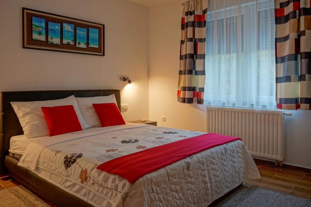 Postel nebo postele na pokoji v ubytování Apartments Paradise