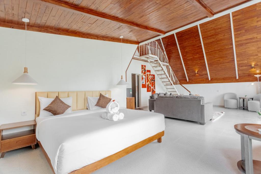 Postel nebo postele na pokoji v ubytování Svargan Lakeside Glamping