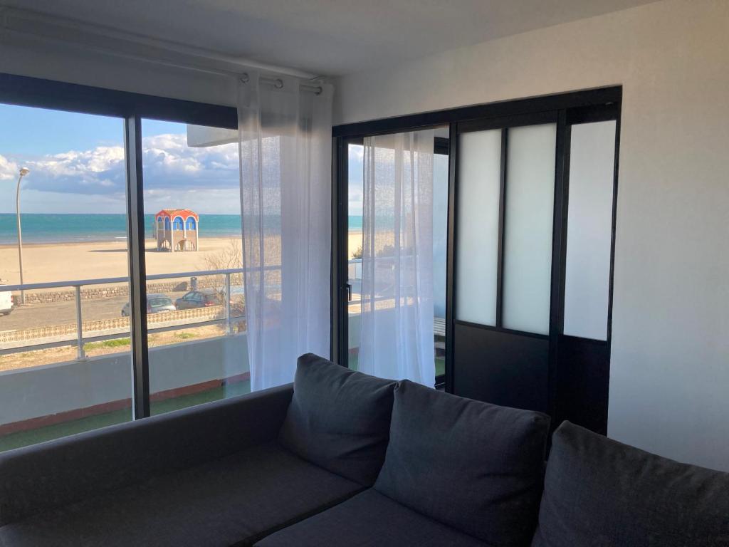 Posezení v ubytování Appartement Vue Mer climatisé 2 chambres