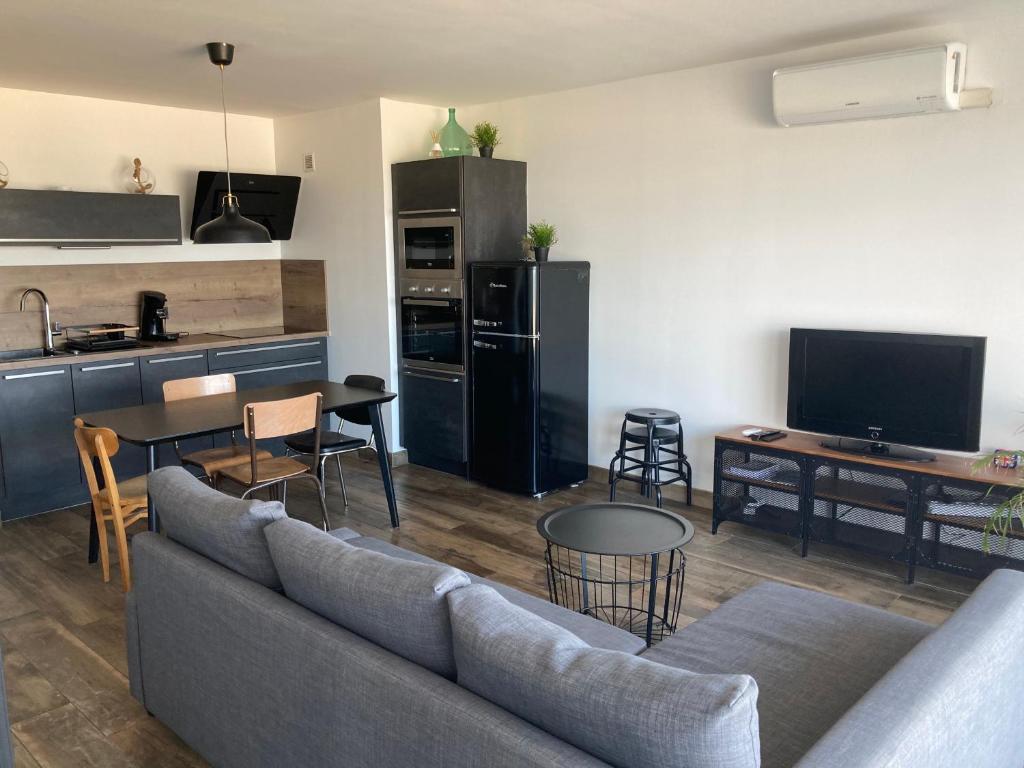 Kuchyň nebo kuchyňský kout v ubytování Appartement Vue Mer climatisé 2 chambres