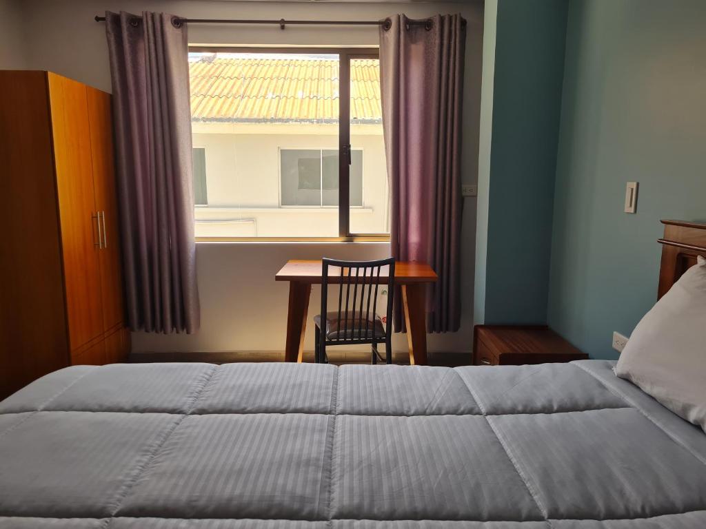 Postel nebo postele na pokoji v ubytování Hostal Morlaquita