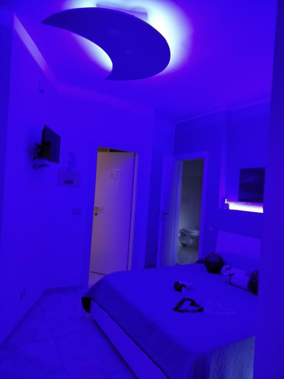 Postel nebo postele na pokoji v ubytování SUN & MOON B&B