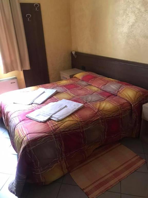 Postel nebo postele na pokoji v ubytování Hotel ristorante 2 Platani