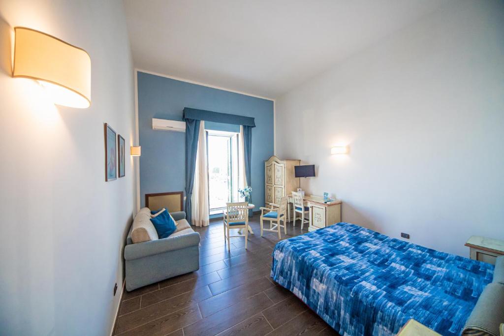 Postel nebo postele na pokoji v ubytování La Rada B&B