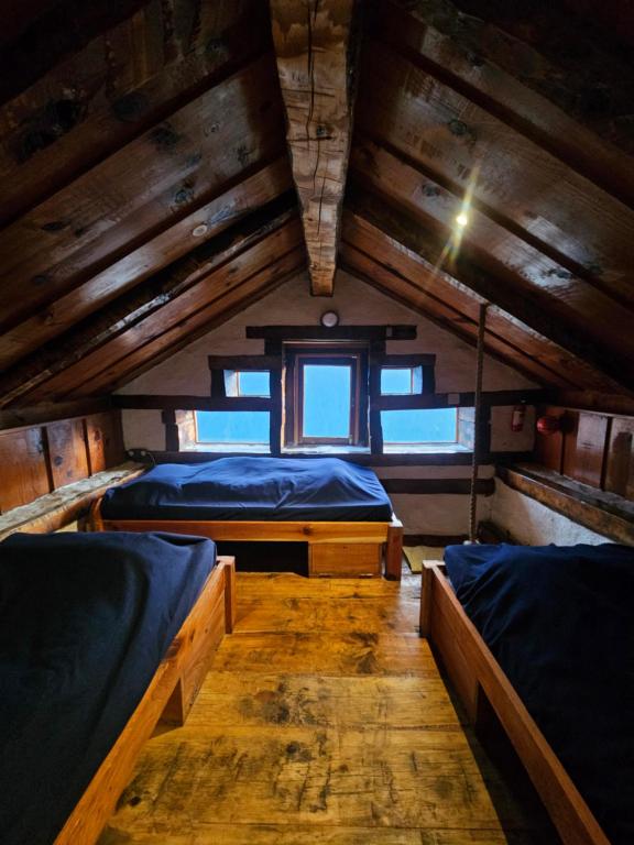 Postel nebo postele na pokoji v ubytování Parvatis Lap Luxury Hostel & Camps