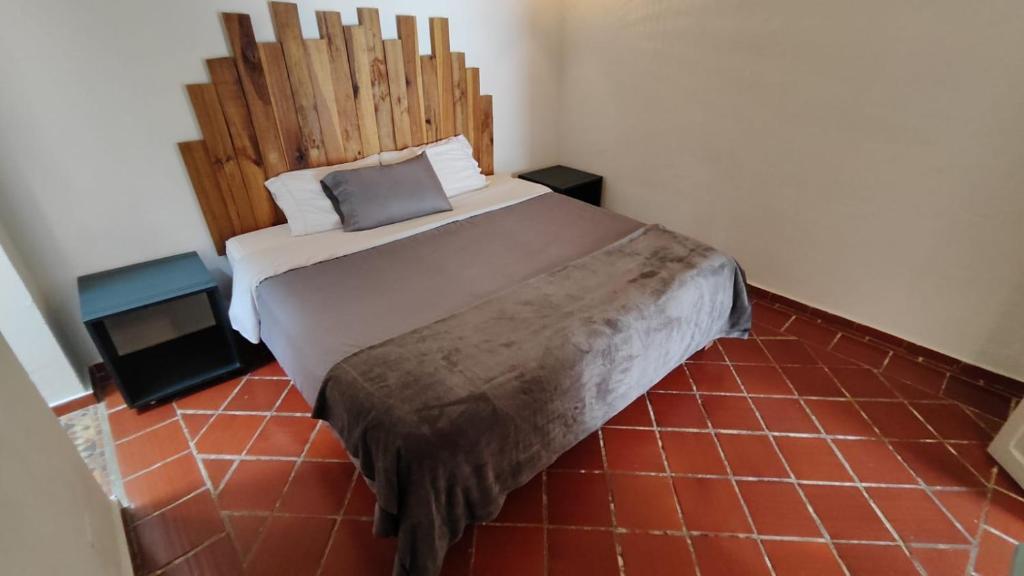 Postel nebo postele na pokoji v ubytování Popichi Hostel