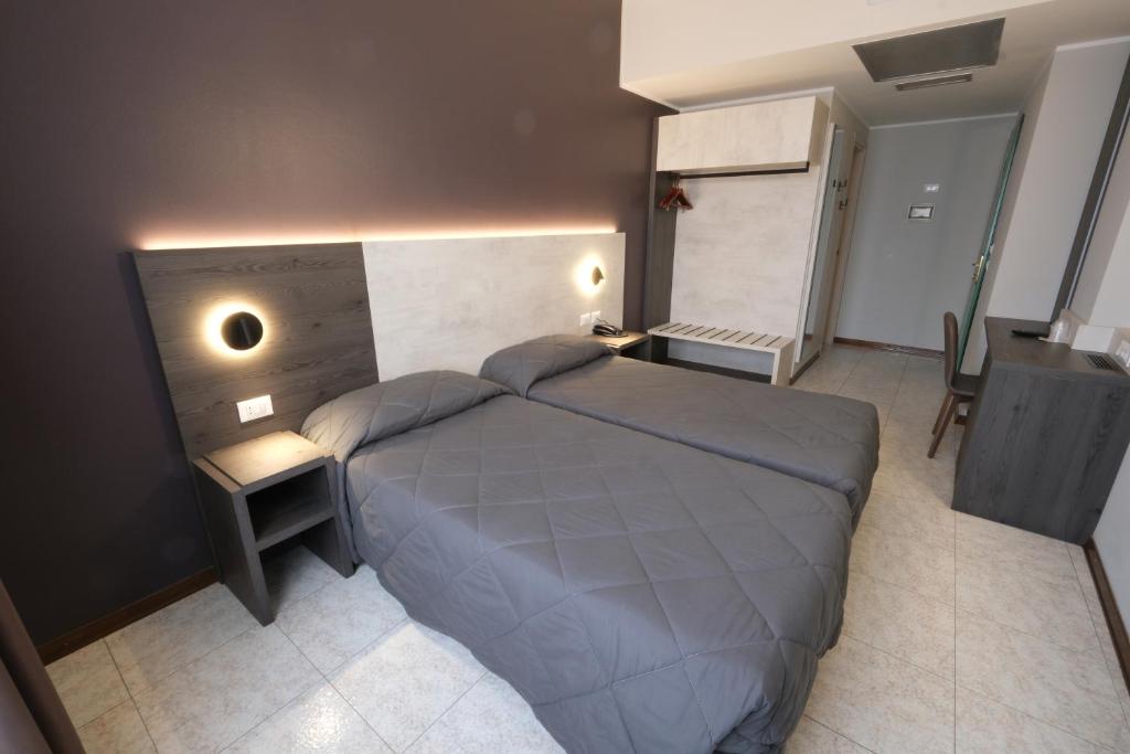 Postel nebo postele na pokoji v ubytování Hotel Mistral