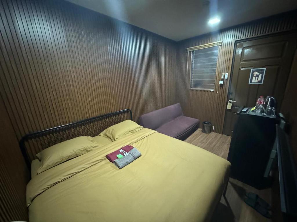 Postel nebo postele na pokoji v ubytování Kostkan House