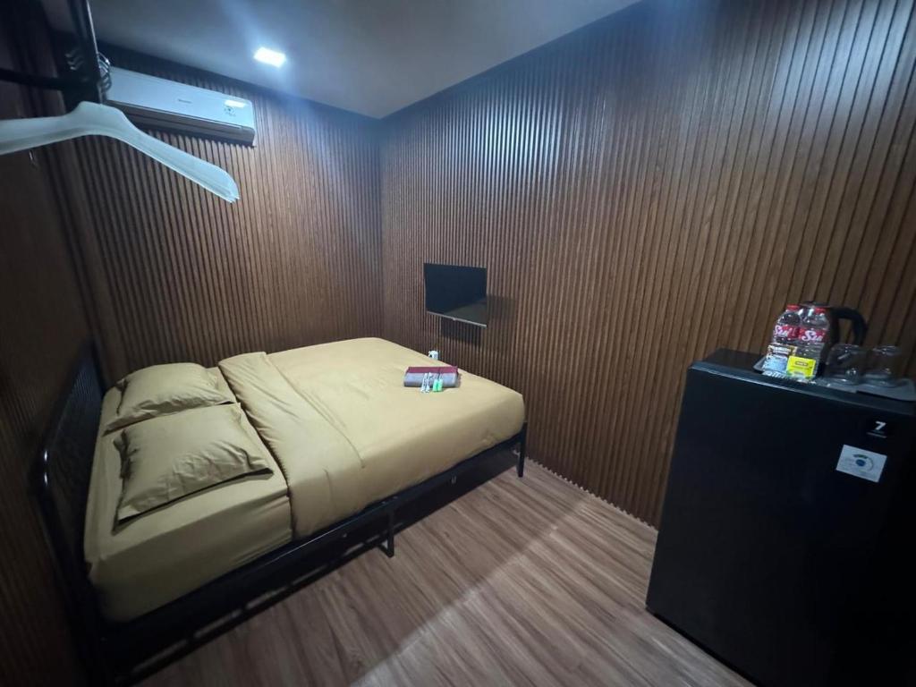 Postel nebo postele na pokoji v ubytování Kostkan House