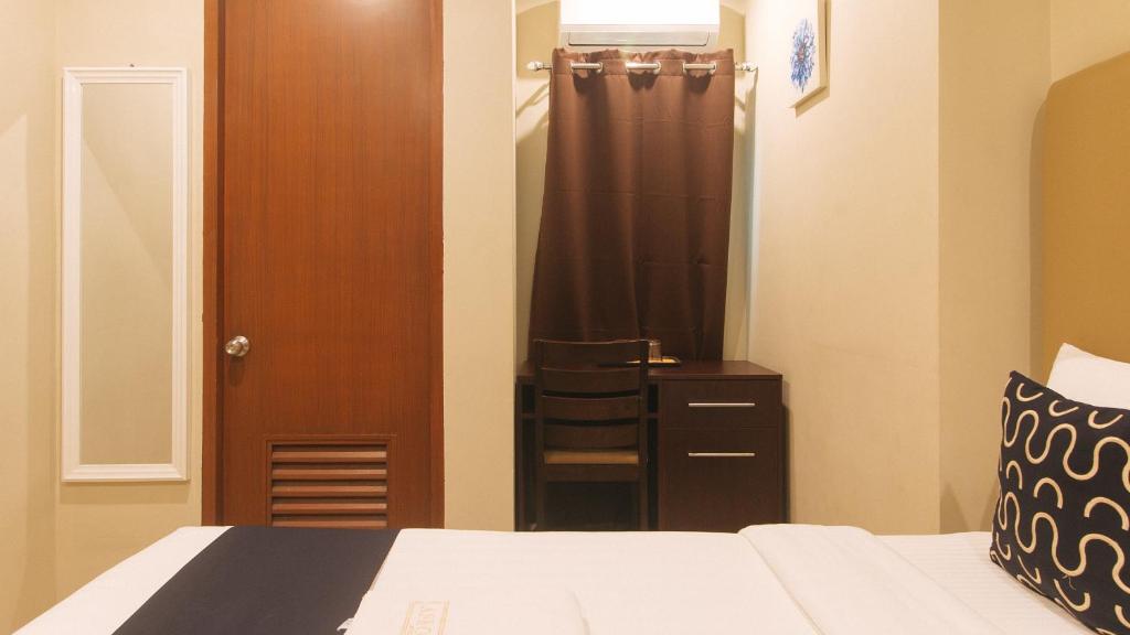 Postel nebo postele na pokoji v ubytování Asrodel Hotel RedPartner